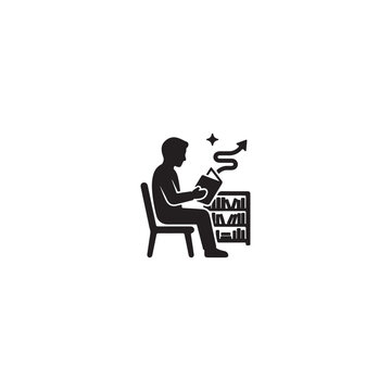 Person sitting on a chair reading a book in the library
