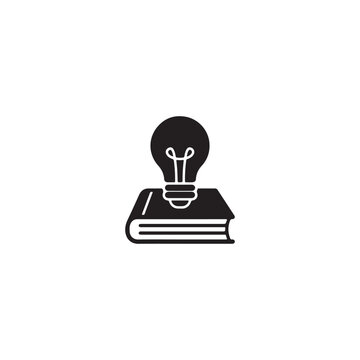 Black book icon with a light bulb idea symbol
