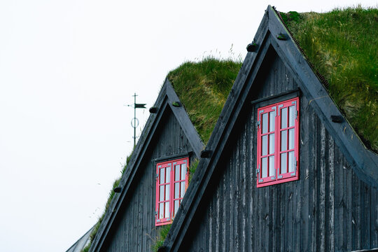 1st floor of a grass house with red windows, Streymoy, Faroe Islands