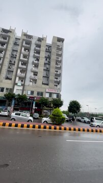 Rainy Urban Street with Residential Buildings in Islamabad, Pakistan