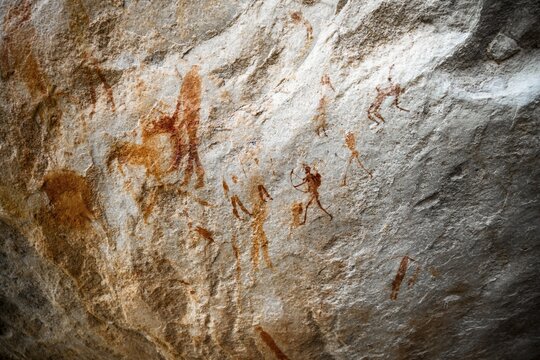 Prehistoric hunter with bow, ancient rock carving of the San, indigenous people of South Africa, Seville Rock Art Trail, Cedar Mountains, Clanwilliam, Western Cape, Republic of South Africa