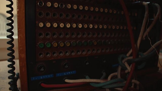Close view of vintage communication jack panel with analog connectors from historic telephone switchboard system