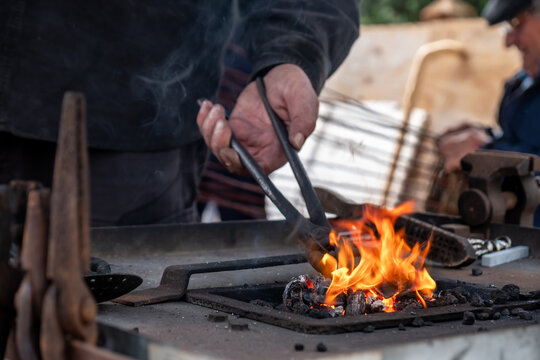 Balcksmith at work during the Ardara Show in County Donegal, Ireland