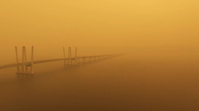 Smoke from the Canadian wildfires hangs over the Hudson River and conceals part of the Mario Cuomo Bridge (summer 2026).