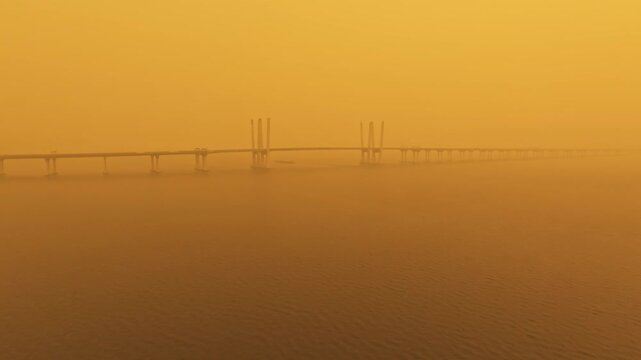 Wildfire smoke surrounds the Hudson Valley during sunset, creating an eerie, smokey glow across the river (summer 2026).
