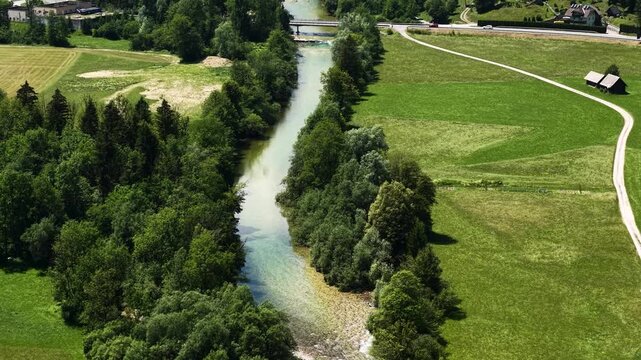 Drone Shot of Crystal Clear River in Green Landscape eof Slovenia, Triglav National Park