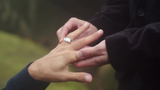 man and woman hands, couple hands, hands together, romantic touch, love gesture, holding hands, interlocked fingers, gentle grip, wedding rings, couple bonding, intimate moment, close up, no face, 