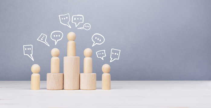 Concept of social networking, discussion, opinion and brainstorming with wooden people models