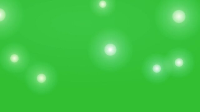 Glowing White Particle Lights Floating On Green Screen Chroma Key Background For Video Overlay Effects Loopable Bokeh Animation