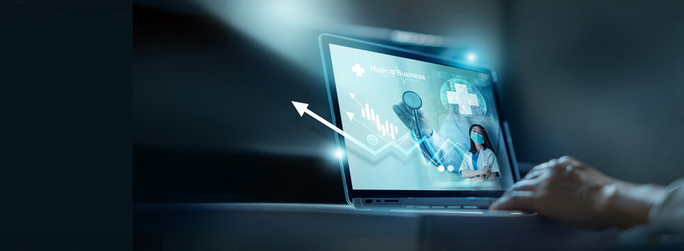 Healthcare business graph and data of Medical business growth .Businessman analyzing data and growth chart on laptop, investment, financial and banking, Medical service to solve people health.