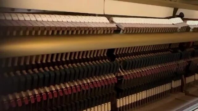 The Inside of a Piano While Playing