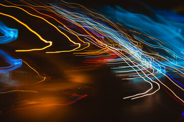 Night light trails in Bangkok city streets create a vibrant scene © Kayro