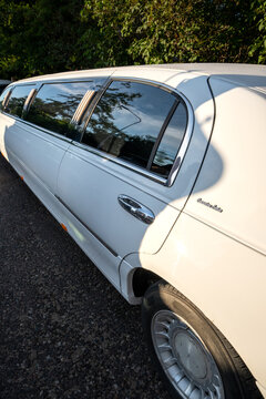 Valmiera, Latvia - July 24, 2026: White stretch limousine parked outdoors