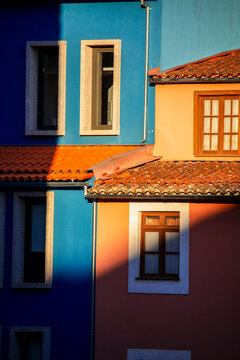 Colourful fa&ccedil;ades in the historic centre of Guarda, Portugal, bathed in the evening light