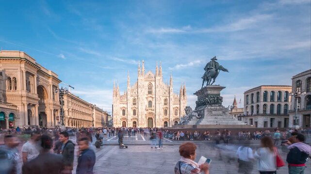 Timelapse of Milan Cathedral and Piazza del Duomo featuring the iconic Gothic facade, bustling square and the equestrian statue of Victor Emmanuel II.