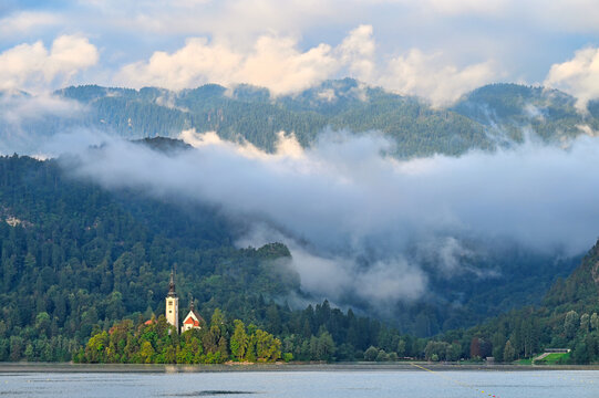 Bled Island Church In Rising Mist On Lake Bled Slovenia At Sunrise