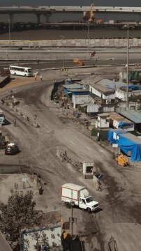 Truck Brought Metal Structures For Construction Of Highway. Aerial View Of Highway Construction Site. People At Work. Construction Of New Highway Is Underway. Time Lapse, Timelapse, Time-lapse