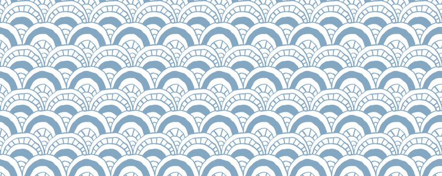Seamless hand drawn scallop pattern, blue and white wave scales texture for textile design