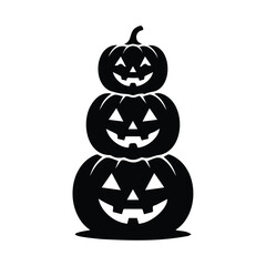 Obraz premium Stack of three jack o lantern pumpkins with smiling faces for seasonal autumn decorations.