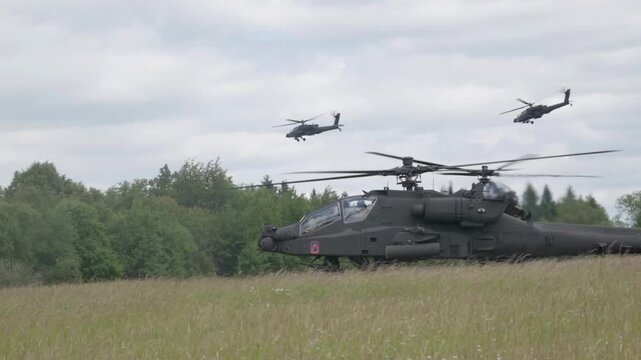 AH-64 Apache Gunships in Tactical Flight Formation
