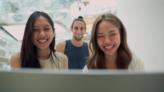 group of people smiling and waving hands in a happy and friendly indoor setting with a white background close-up shot of the group, social media content creation.
