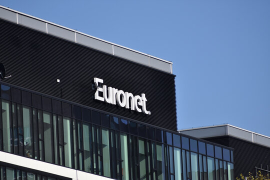 Euronet Wordwide company office with logo, emblem, signage on the facade. WARSAW, POLAND - APRIL 25, 2026