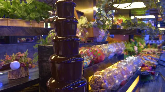 Luxury dessert buffet with chocolate fountain and candies