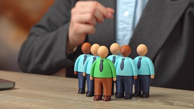 A businesswoman appoints a new leader to her business team. The art of team management. Achievements in management. Authority and discipline.