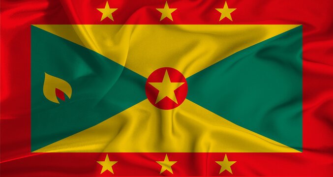 Realistic Grenada flag waving. Close up of flag of Grenada with cloth texture