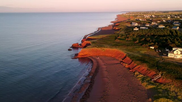Long red cliff coastline at Thunder Cove Beach, aerial view, Prince Edward Island, Canada