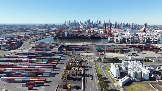 Aerial view of Melbourne port with container ships and cranes