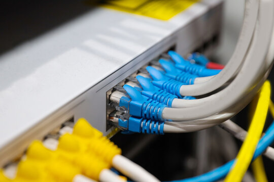 LAN internet network cable or RJ45 UTP fiber optic connect to network management equipment for cloud computing computer data link file transfer or wifi networking devices technology server system.