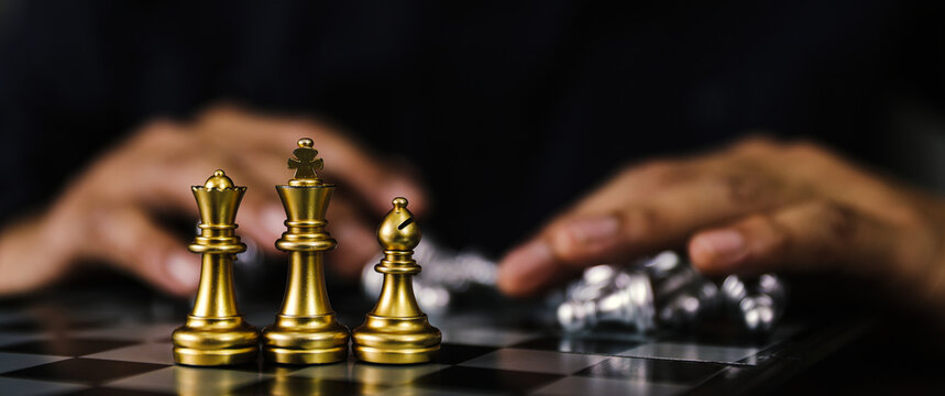 King chess on falling chess concept of business strategy plan and leadership or wining challenge and team player and risk management or human resource or strategic planning.
