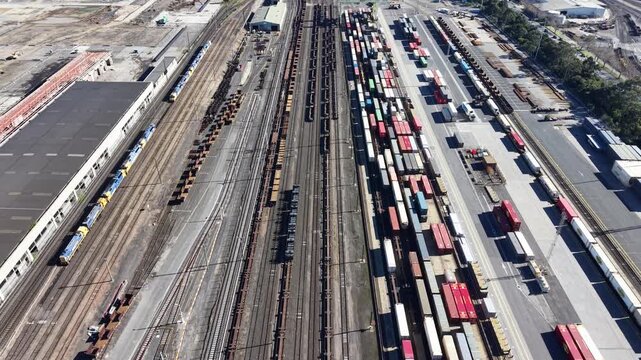 Aerial view of industrial freight trains and containers