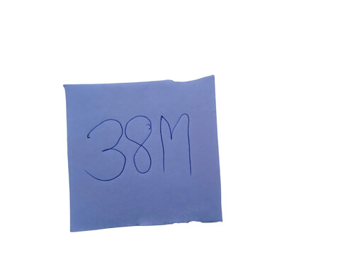 The numbers '38' followed by the letter 'm' are handwritten in blue ink on a square piece of light blue paper