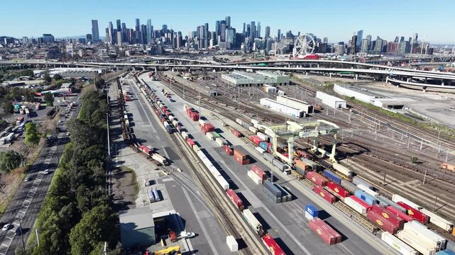 Aerial view of Melbourne freight hub with city skyline