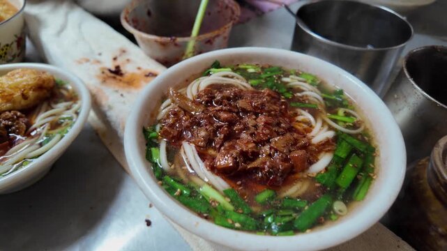 Traditional Yigen Mian One-Root Noodles Being Hand Pulled in Weishan, Yunnan, China, Local Food Culture