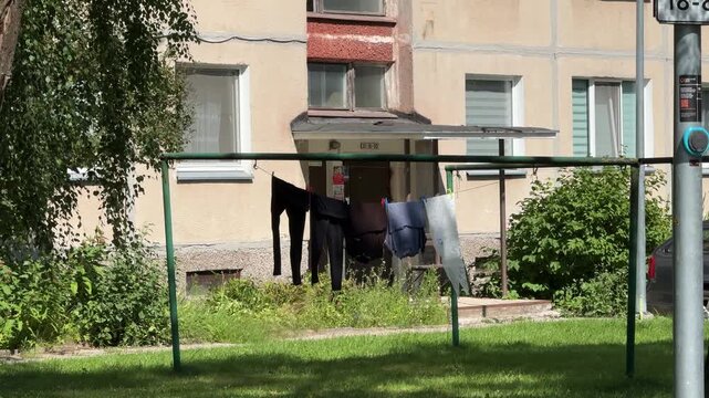 Laundry Drying in Sunny Residential Courtyard in Vilnius