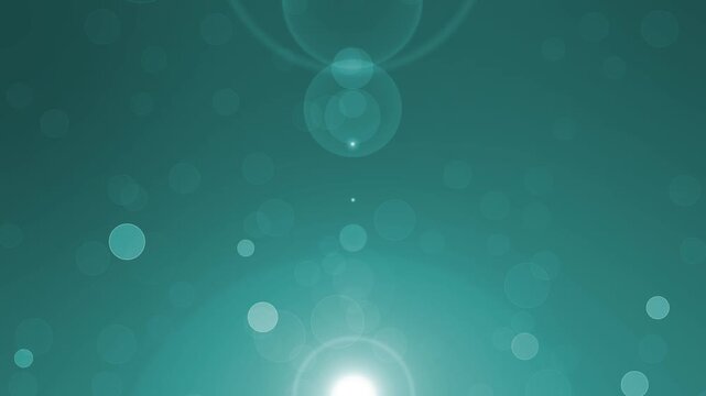 Abstract bokeh background with warm light flare near bottom center animation