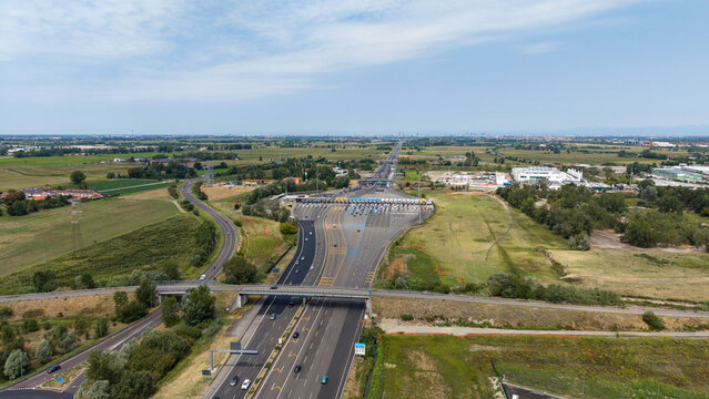 Highway Traffic Flow At Italian Motorway Toll Station. Melegnano, Italy