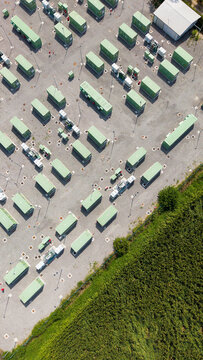 Drone view of a modern Battery Energy Storage System (BESS) facility in Tavazzano, Lombardy, Italy, supporting renewable energy integration, grid stability and sustainable power infrastructure.