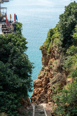 Fototapeta premium Scenic cliffside restaurant terrace overlooking Mediterranean sea in Antalya Turkey