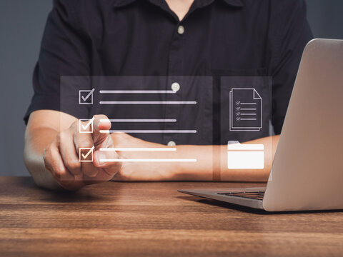 Person completing a digital checklist on laptop