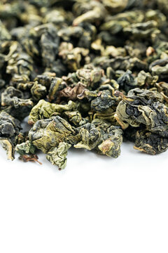 Aromatic Tie Guan Yin detail on clean white backdrop