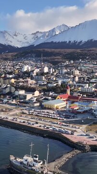 Ushuaia Skyline At Ushuaia In Tierra Del Fuego Argentina. Snow Capped Mountains Landscape. Patagonia Background. Downtown Cityscape. Ushuaia Skyline At Ushuaia In Tierra Del Fuego Argentina.