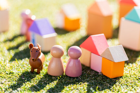 Childs toy blocks making pet dog and rental home concept