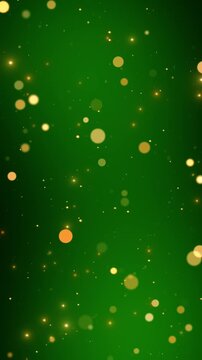 abstract green hristmas and new year glitter stars and golden bokeh lights animation ,winter holiday celebration shiny and glowing gold particles vertical social media motion background