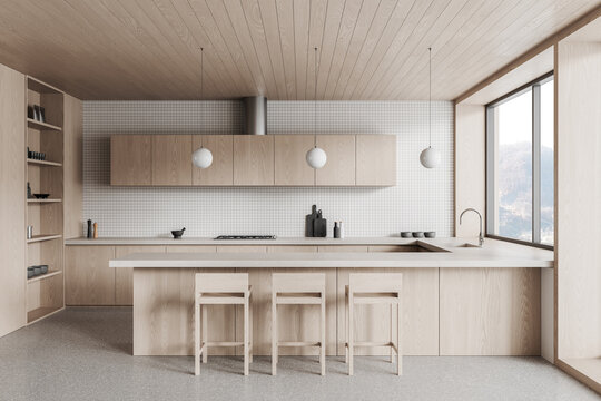 Minimalist light wood kitchen interior with modern island, pendant lights and large window view creating calm contemporary design atmosphere.. 3D Rendering