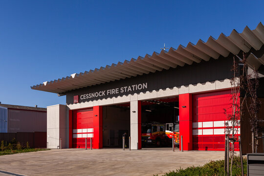 Cessnock Fire Station building in bright sunlight with bay doors open Fire and Rescue NSW