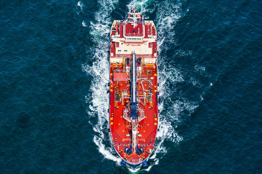 Aerial view of an oil tanker navigating through deep blue ocean waters on Sydney Harbour